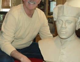 Sculptor known for honoring car racing greats turns attention to Father Tolton
